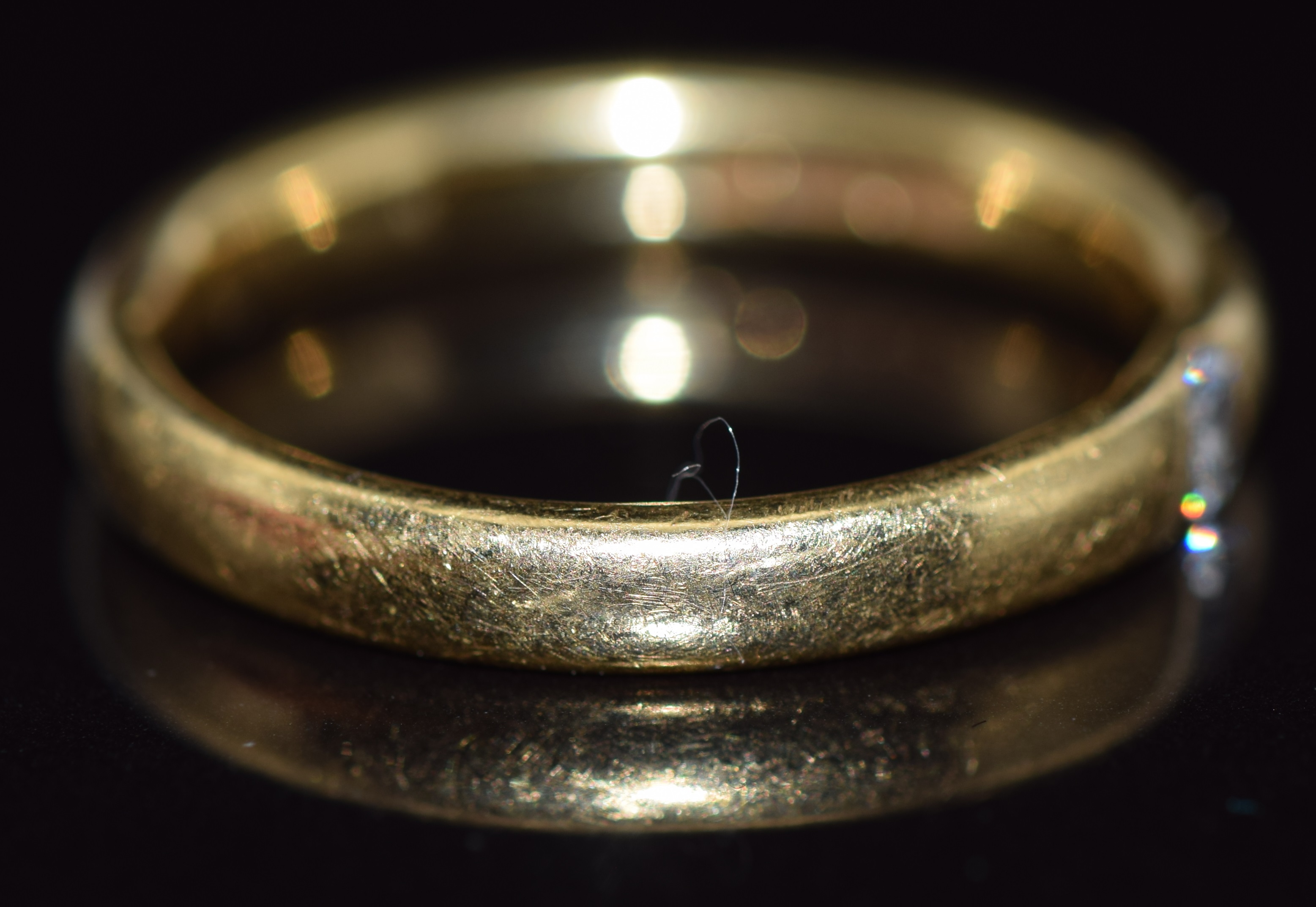An 18ct gold ring set with a diamond of approximately 0.1ct, 4.0g, size M/N - Image 2 of 2