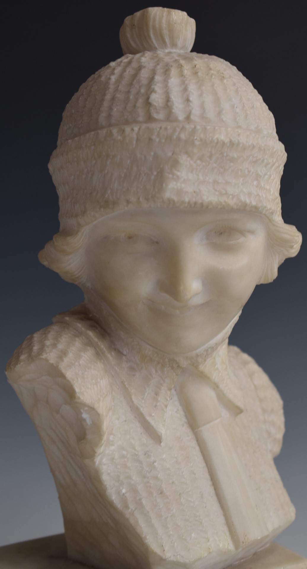 Austrian or similar early 20thC carved alabaster study of a young lady in jumper and hat, - Image 2 of 5