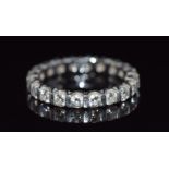 A platinum eternity ring set with 20 round cut diamonds each approximately 0.1ct, made by Mappin and