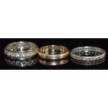 A 9ct gold wedding band (2.0g, size M), silver ring (1.4g, size P) and silver and 9ct gold ring, 2.