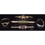 Three 9ct gold brooches set with garnet, seed pearls and paste and two 9ct gold rings, 7.3g