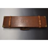 Stephen Grant & Joseph Lang leather bound shotgun case with fitted interior, brass lock and fittings