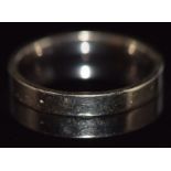 An 18ct white gold wedding ring/ band, 3.2g, size N/O