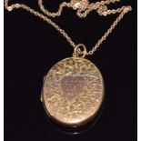 Victorian 9ct gold back and front locket with engraved ivy decoration and 'To Lizzie from Ben' on
