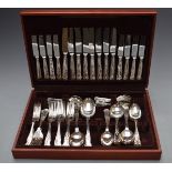 An eight place setting of King's pattern cutlery, width of canteen 44.5cm