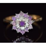 A 9ct gold ring set with amethysts and diamonds, 2g, size N