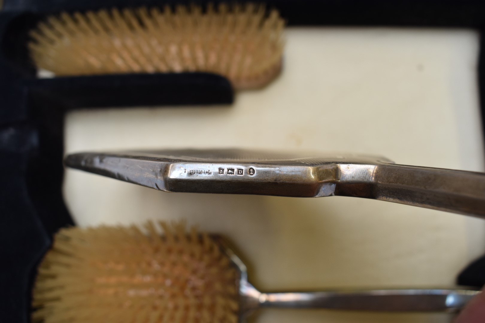 Cased Art Deco hallmarked silver mounted dressing table set comprising hand mirror, two brushes - Image 5 of 5