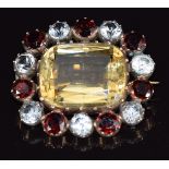 Victorian brooch set with a large citrine, garnets and paste, 3.1 x 2.7cm