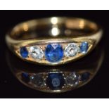 A c1920 18ct gold ring set with round cut diamonds and sapphires, 5.5g, size O