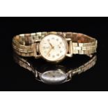 Tudor 9ct gold ladies wristwatch with subsidiary seconds dial, gold hands and Arabic numerals, cream