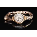Edwardian 9ct gold ladies wristwatch with blued Breguet hands, Arabic numerals, silver dial and