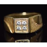 A yellow metal ring set with four diamonds, 3.7g, size I