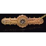 A 15ct gold brooch set with a diamond, 3.7cm long, 3.1g