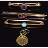 Three 9ct gold brooches, one set with turquoise (5.1g) and a one dollar coin charm (1.4g)