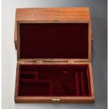 Two wooden pistol or revolver cases or display boxes, both with velvet lined fitted interiors,