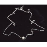 A 9ct white gold necklace set with a pearl, 2.1g