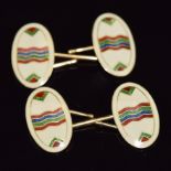 A pair of Art Deco 18ct gold cufflinks set with cream enamel with red, green and blue guilloché