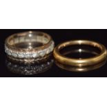 A 22ct gold band (4.3g, size K) and a 9ct gold band, 2.5g, size I