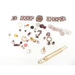 A collection of damaged sections of garnet jewellery, mother of pearl studs, etc