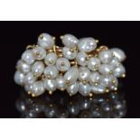 A 9ct gold multi band ring with a cluster of beaded pearls, 9.3g, size N