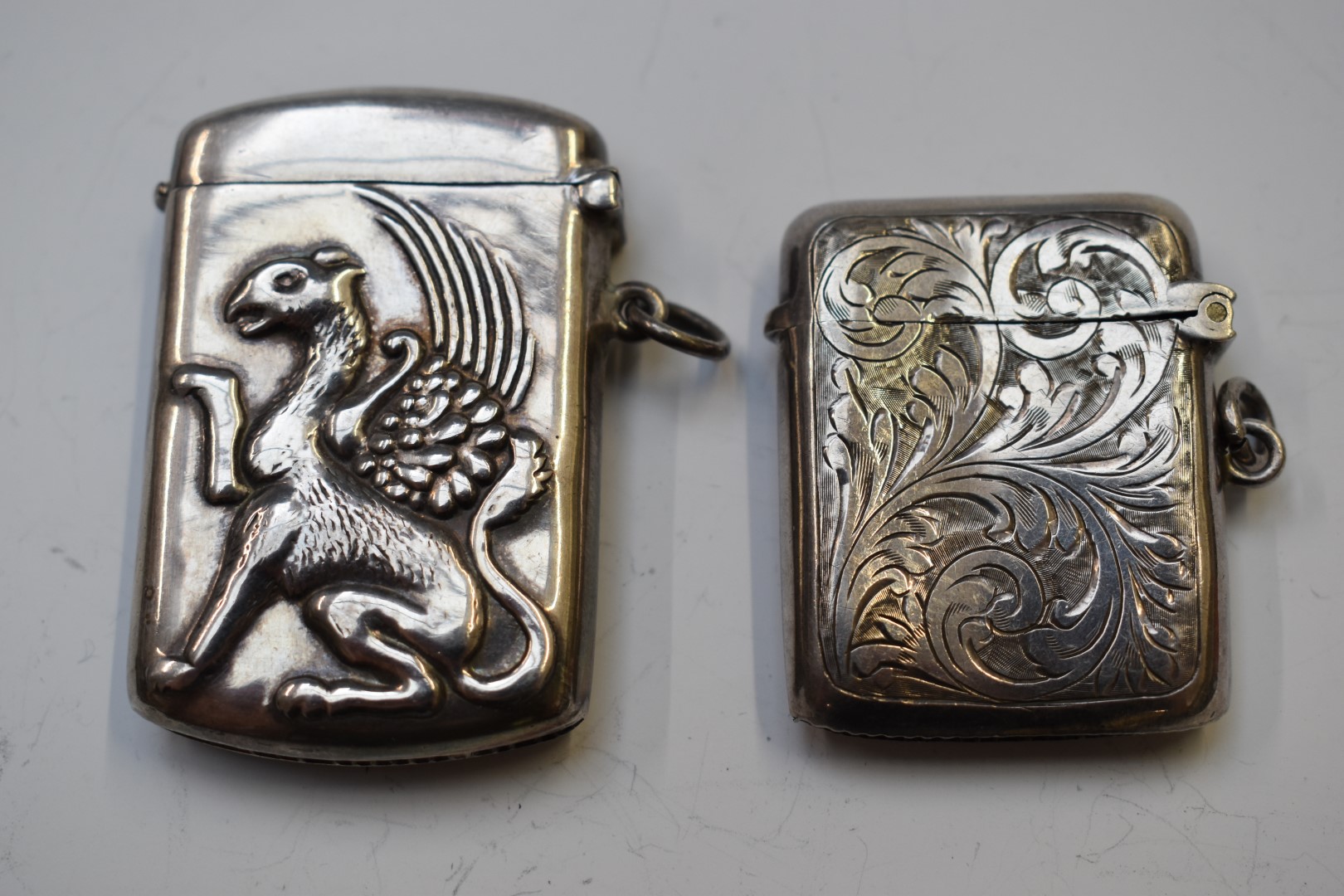 Two silver vesta cases, one Birmingham 1911, maker Williams (Birmingham) Ltd, the other marked