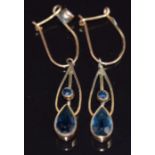 A pair of 9ct gold earrings set with paste, 1.4g