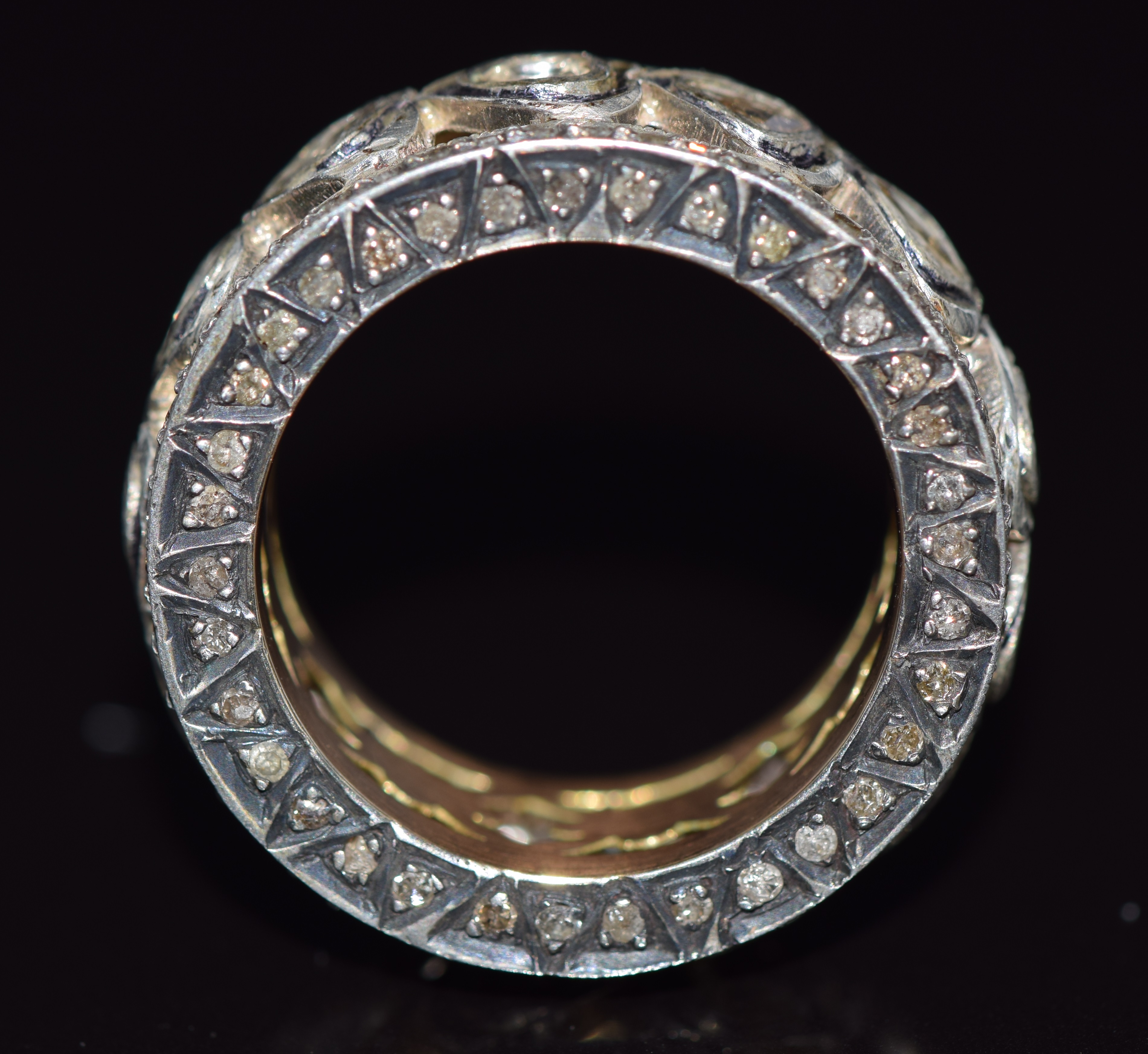 A large pierced gold ring set with diamonds in foiled settings with further diamonds to the edges - Image 2 of 2