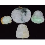 Four Chinese jade pendants, largest 4.8cm