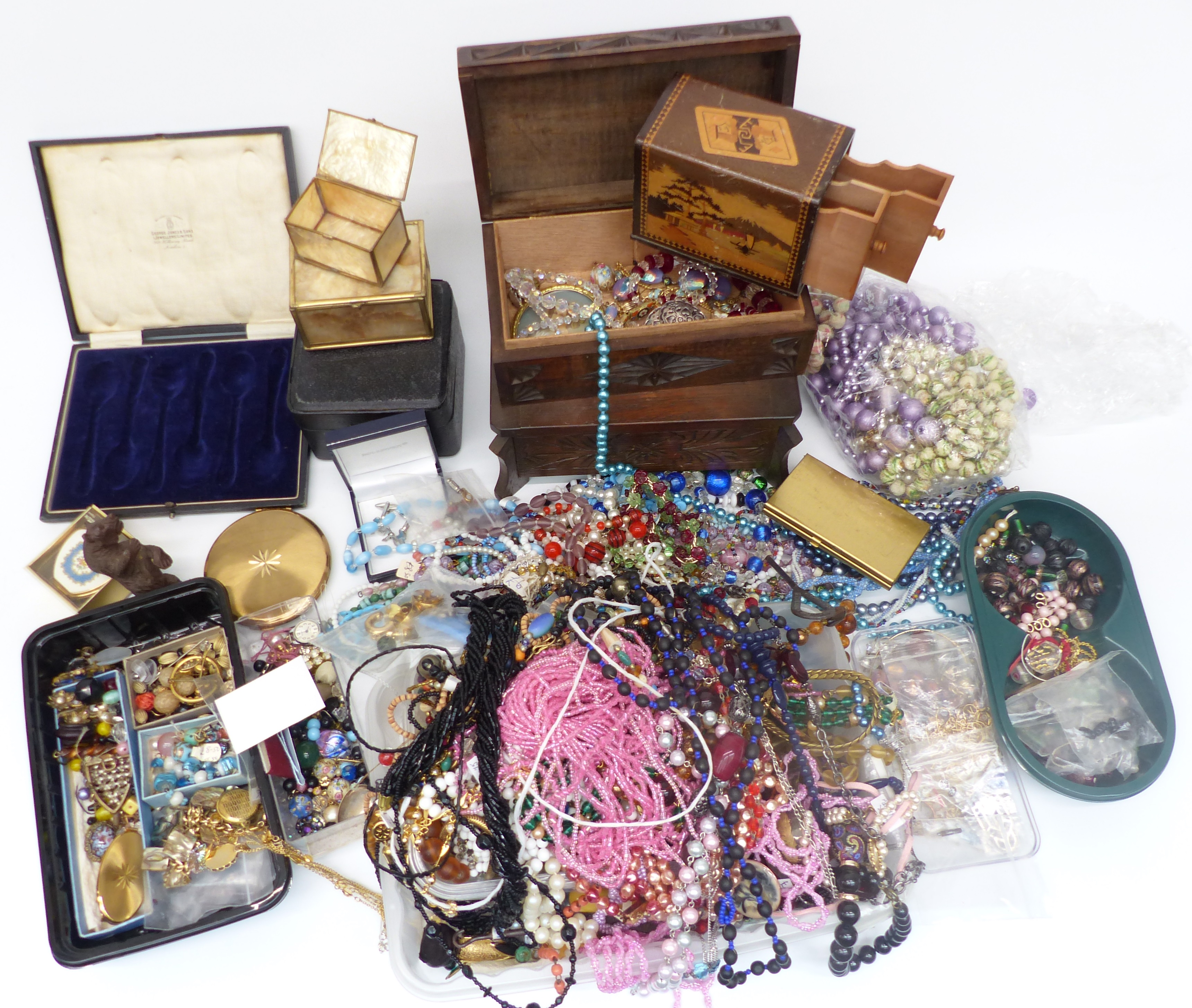 A collection of costume jewellery including vintage necklaces, Art Deco crystal necklace, beads, etc