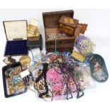 A collection of costume jewellery including vintage necklaces, Art Deco crystal necklace, beads, etc