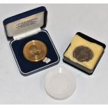 Prince of Wales 60th Birthday crown, Royal Mint brass prototype, a rubber proof and a cupro-nickel