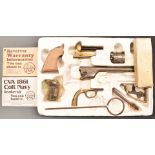 CVA model Colt Navy 1861 revolver kit with brass frame, wooden grips, engraved scene of ships to the