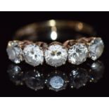 A 9ct gold ring set with five cubic zirconia, 3.2g, size P/Q