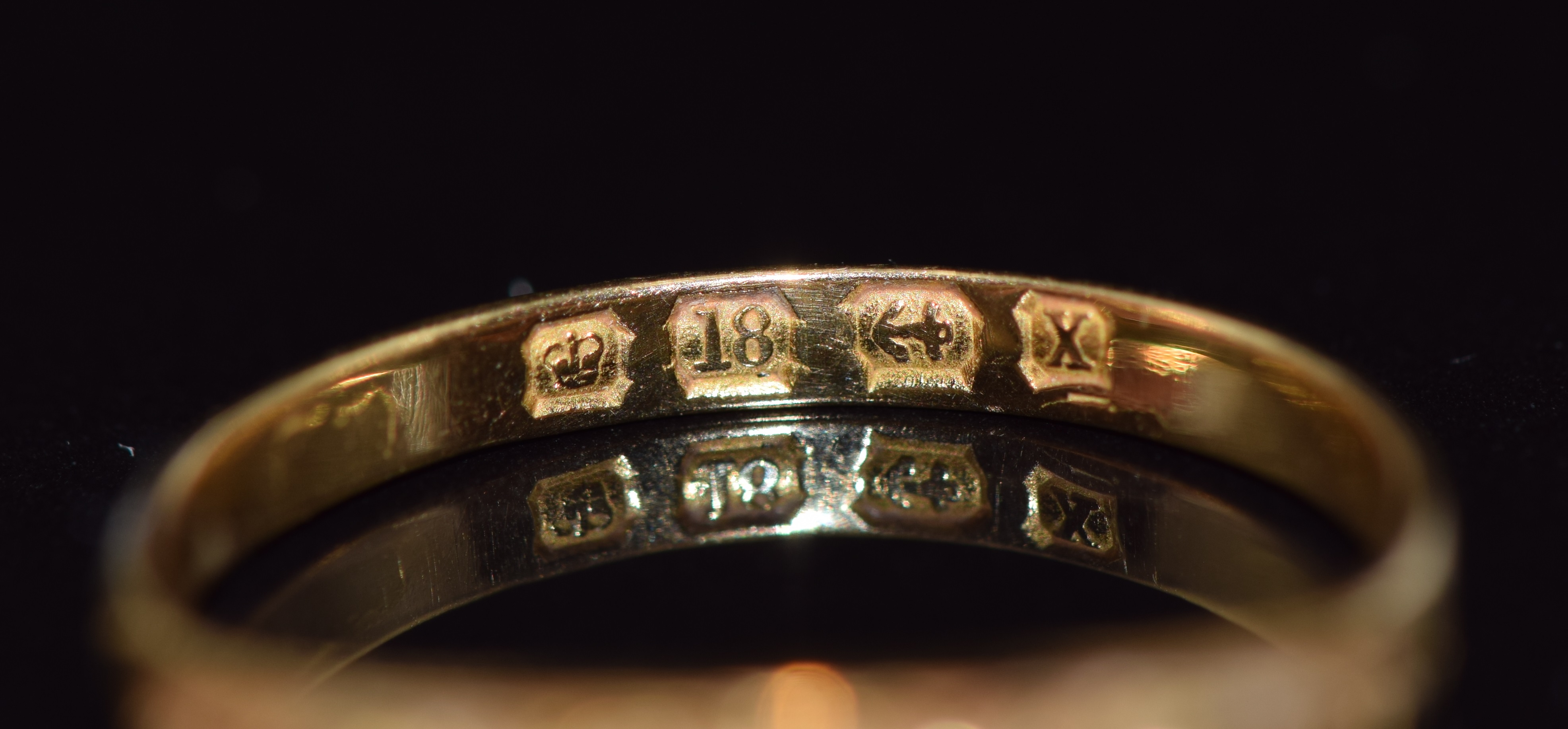 An 18ct gold ring set with five old cut diamonds in a scrolling setting, Birmingham 1922, 2.6g, size - Image 3 of 3