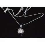 A 9ct white gold pendant set with diamonds, on 9ct white gold chain, 1.8g