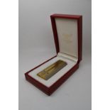 Cartier silver and gold plated lighter with screwed on panel decoration, in original Must de Cartier