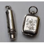 Novelty white metal roller or coil type stamp dispenser, marked sterling silver, length 5.5cm and
