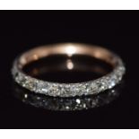 Georgian / Victorian eternity ring set with old cut diamonds in a foiled setting, size F