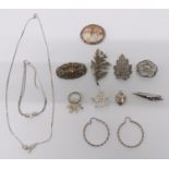 Silver brooches, cameo brooch, silver earrings, silver necklace with matching bracelet, etc