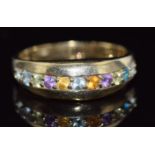 A 9ct gold ring set with a citrine, amethyst, peridot and topaz, 4g, size R/S