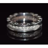 A white metal ring set with diamonds, marked Bulgari, 6.3g, size O