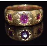 Victorian yellow metal ring set with three rubies in star settings (5g), in Saqui & Lawrence ring