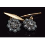 A pair of yellow metal cufflinks set with rose cut diamonds, 6.2g