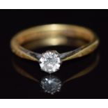 An 18ct gold ring set with a round cut diamond of approximately 0.25ct, 2.5g, size L/M