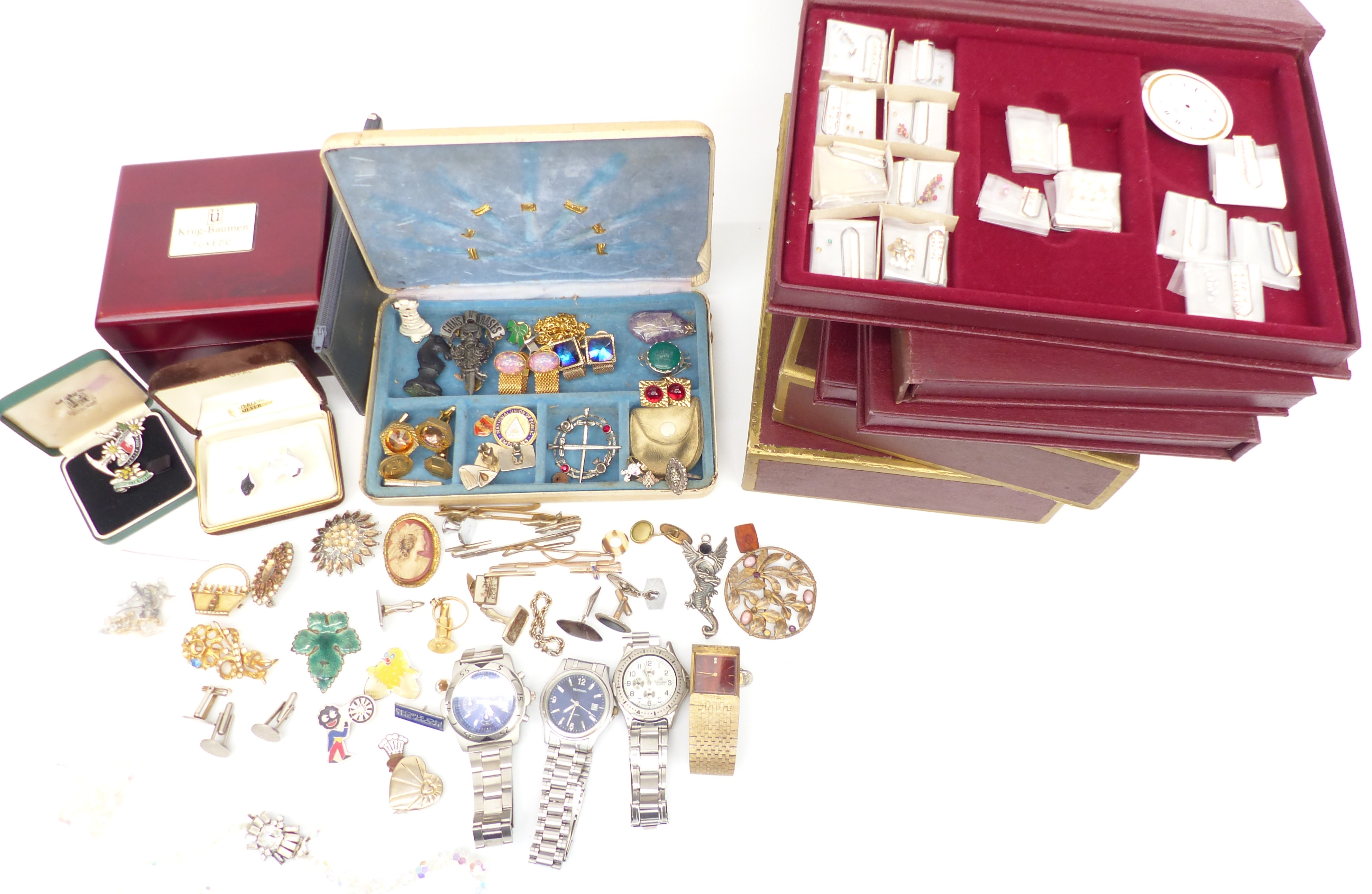 A collection of jewellery including silver cufflinks, other cufflinks, brooches, silver ring,