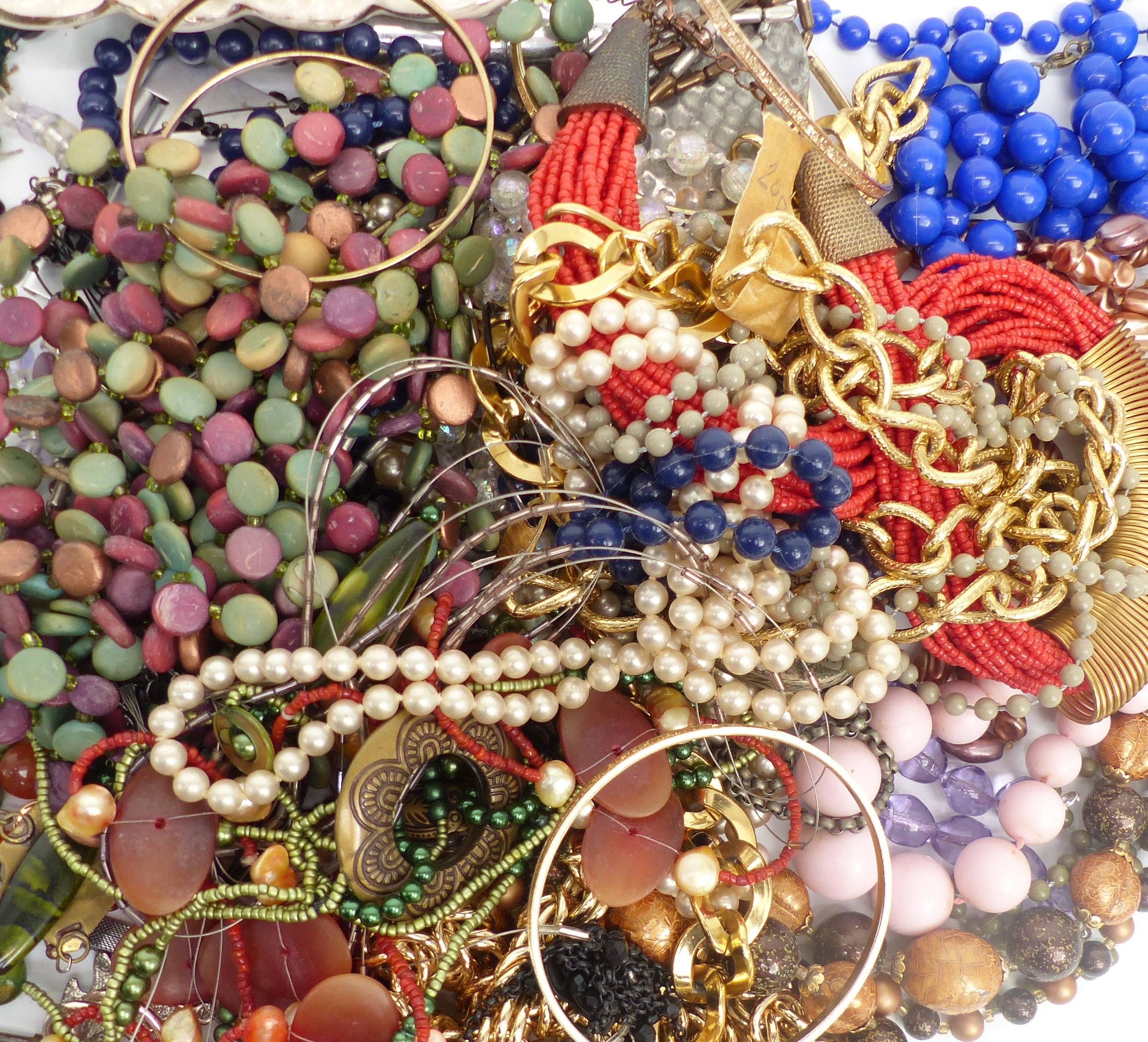 A collection of costume jewellery including necklaces, enamel and marcasite brooch, earrings, rolled - Image 4 of 4