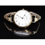 J W Benson 9ct gold wristwatch with subsidiary seconds dial, blued hands, black Arabic numerals,