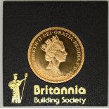 1987 Royal Mint one ounce gold Britannia uncirculated, in Perspex case