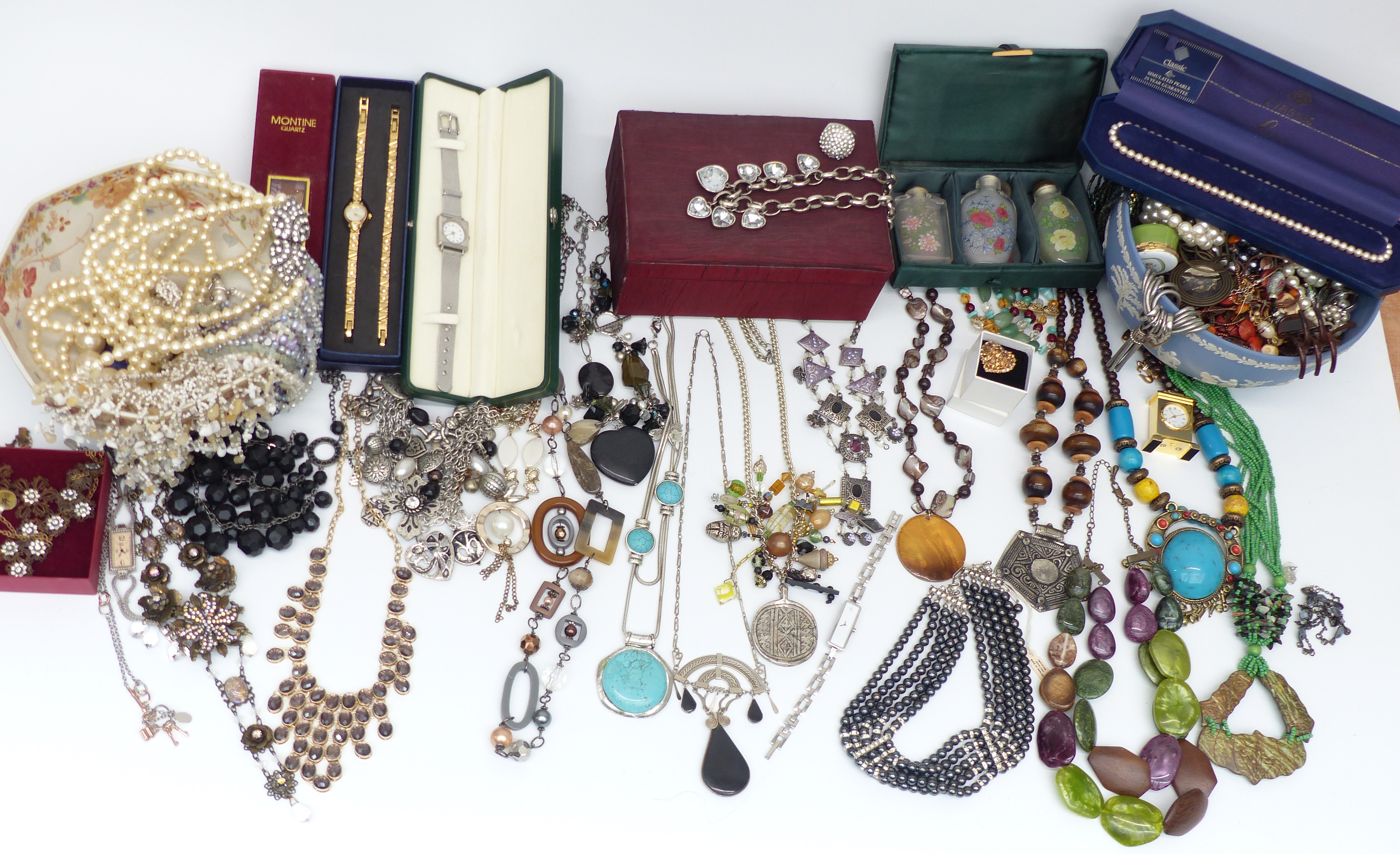 A collection of costume jewellery including Armani Exchange necklace, other necklaces, etc