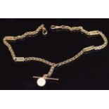 Victorian 9ct gold double Albert made up of engraved and faceted links, 17g, 64cm long